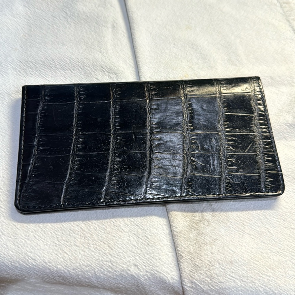 Brighten check and card holder. Never used perfect condition.